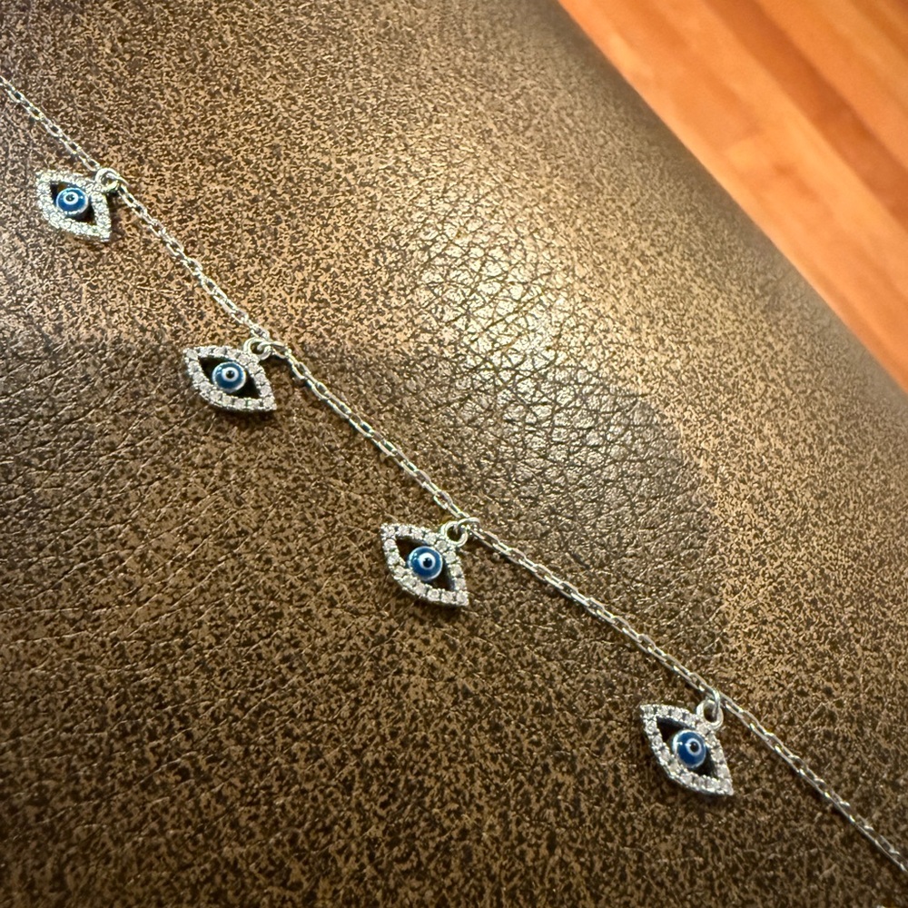 Silver and Blue Evil Eye Bracelet with Pendants